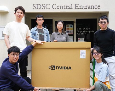 Members of the Hao Lab with the NVIDIA gift, still boxed, outside of SDSC. Top row (left to right): Lanxiang Hu, Yichao Fu, Mingjia Huo, Hao Zhang. Second row (left to right): Peiyuan Zhang, Junda Chen. Photo courtesy of SDSC